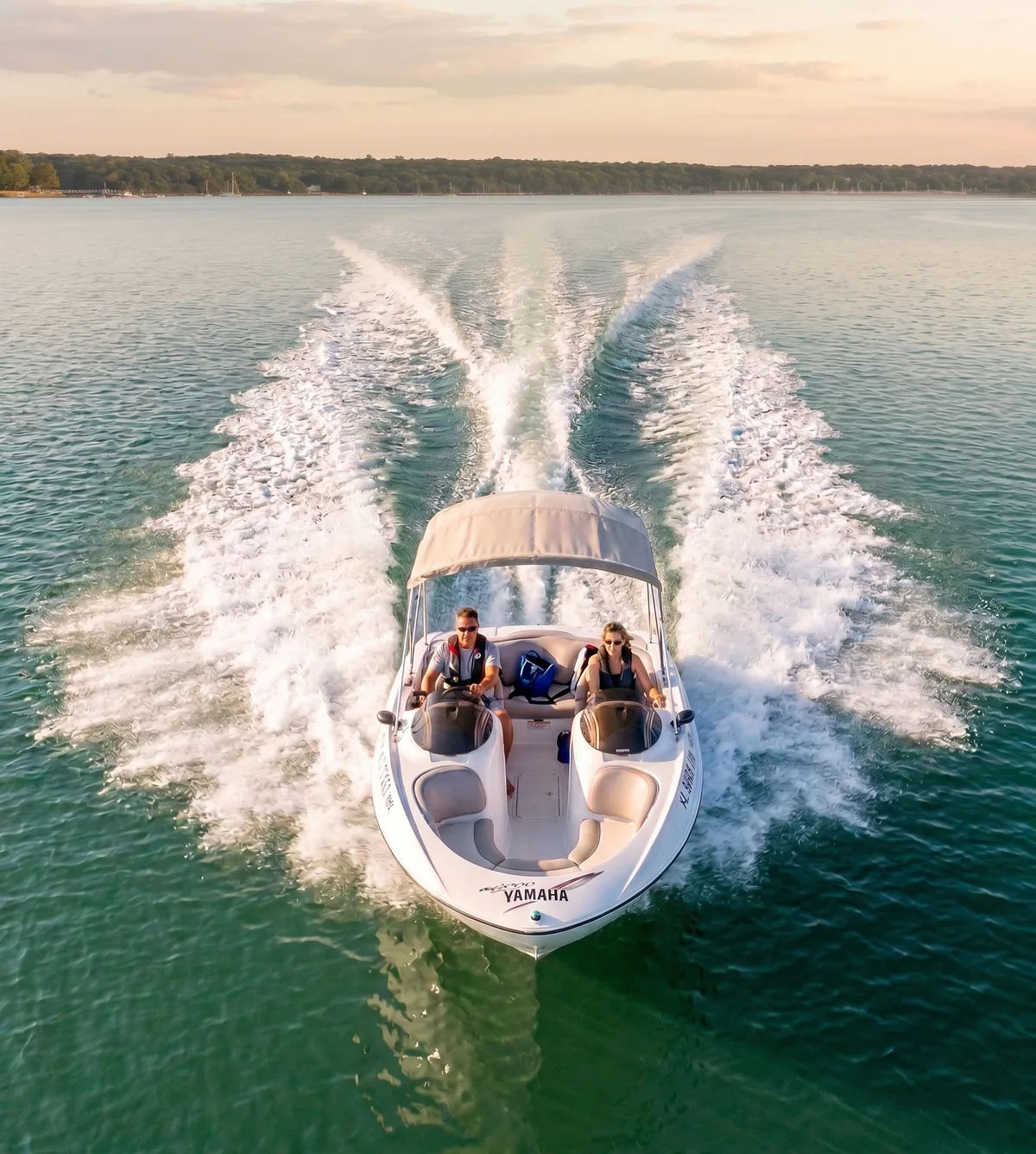 Aerial view of Yamaha twin jet boat cruising Oyster Bay